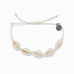 Need a beachy new bracelet? Oh, shell yes! Our Knotted Cowrie Bracelet is the perfect piece for all you beach babes, with a strand of mini cowrie shells that’ll up your seaside style. Preppy Jewelry, Seaside Style, New Bracelet, Pura Vida Bracelets, Cowrie Shells, Birthday Wishlist, Cowrie Shell, Girly Jewelry, Cord Bracelets