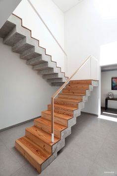 there is a wooden stair case in the house