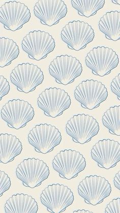 a wallpaper with blue scallop shells on it's back and sides