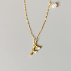 This is a simple yet beautiful letter pendant necklace on a dainty 18K gold plated 19"-21" chain. Makes the perfect personalized gift for any occasion. FEATURES Pendant Necklace in real 925 Sterling Silver Initial Pendant with Freshwater Pearl Comfortable to wear Lightweight and safe Hypoallergenic 🚚 Free Shipping Worldwide Estimated Delivery time: 8 to 13 business days 🎁 Ideal Gifts: Christmas gifts, family jewelry, friends gifts, couple gifts, anniversary gifts, birthday gifts, party gifts, Christmas Gifts Family, Gifts Couple, Bamboo Texture, Family Jewelry, Friends Gifts, Sterling Silver Initial, Letter Pendant Necklace, Family Jewellery, Gifts Anniversary