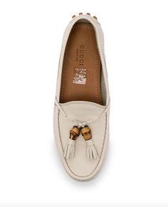 Highlightstaupe beige leather tassel detailbranded insoleround toeslip-on style pebbled rubber soleMade in ItalyCompositionOuter: Leather 100%Lining: Leather 100%Sole: Rubber 100%Designer Style ID: 370695BXO00Colour code: 9022 MYSTIC WHITE Colour Code, Tassel Loafers, Leather Tassel, Designer Style, Rubber Sole, Tassels, Highlights, Loafers, Composition