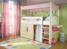 a child's bedroom with pink and green walls, white bunk beds and curtains