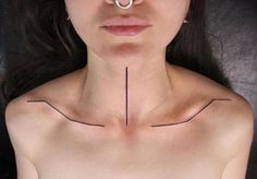 a woman with a nose piercing in front of her face and behind her head is a thin line