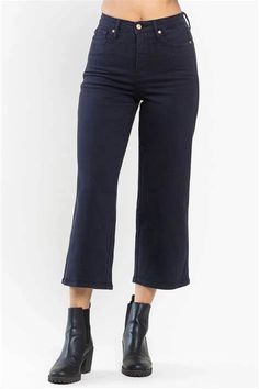 Get ready for fall and stylish layering with these tummy control high-rise wide leg crop jeans. Functional front and back pockets complete these flattering jeans with plenty of stretch. Pair with boots, sandals, heels or flats. Judy Blue Style# 88807 / JB88807 High Rise Zip Fly Control Top 4-Way Stretch Garment Dyed Wide Leg Crop 93% Cotton, 6% Polyester, 1% Spandex True to Judy Blue Sizing Note: the colored Denim from Judy Blue isn't quite as forgiving as the regular denim - if you waver betwee Chic Cropped Dark Wash Pants, Chic Dark Wash Cropped Pants, Denim Blue Cropped Leg Bottoms For Fall, Versatile Denim Bottoms For Fall, Wide Leg Cropped Jeans In Dark Wash For Work, Dark Wash Wide Leg Cropped Jeans For Work, Versatile High Rise Flare Jeans For Fall, Cropped Denim Blue Bottoms For Fall, Fall Cropped Denim Bottoms