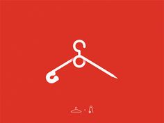 scissors and thread on a red background