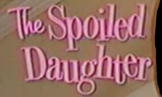 the spooked daughter logo is shown in pink and purple letters on a beige background