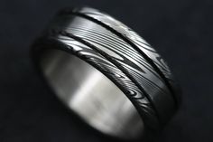 This Genuine handmade Stainless Damascus ring is a 3 piece ring press fit and welded with all hypoallergenic stainless damascus and stainless damascus steel ring body. The ring is finished off with a polished finish which I personally wear as my wedding band! In the notes add your size and 7 or 8mm width. Brushed Finish Stainless Steel Rings For Gift, Stainless Steel Ring With Brushed Finish As Gift, Stainless Steel Ring With Brushed Finish For Gift, 3 Piece Ring, Damascus Ring, Damascus Steel Ring, Laguna Niguel, Men Jewelry, Damascus Steel