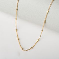 "Dainty and simple, this delicate satellite choker necklace will go with absolutely anything. Perfect worn on its own or layered with longer necklaces. * D E T A I L S * ∙ Material: .925 Sterling Silver or 18K Gold Plated over .925 Sterling Silver ∙ Adjustable length. Available in two sizes: 30cm + 8cm extension chain (12 to 15 inches) & 35cm + 5cm extension chain (14 to 16 inches) ∙ Hypoallergenic & nickel-free * P A C K A G I N G * ∙ All jewelry is sent out beautifully packaged in our Minimalist Adjustable Ball Chain Necklace, Dainty Sterling Silver Station Necklace With Delicate Chain, Dainty Sterling Silver Station Necklace, Delicate Adjustable Necklaces With Satellite Chain, Minimalist Ball Chain Necklace, Delicate Choker Necklace With Satellite Chain, Delicate Satellite Chain Choker Necklace, Dainty Sterling Silver Choker With Delicate Chain, Minimalist Sterling Silver Choker With Delicate Chain