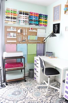 a room with many different types of fabric on the wall and carpeted flooring