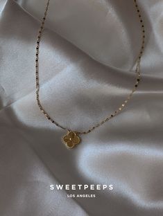 Product Details + Care - 18K Gold Dipped Over Brass - Brass: Copper + Zinc Alloy - 1 Necklace - Wipe Clean - Imported Dimensions - Chain is approximately 16" Have a question? Please message info@shopsweetpeeps.com and our support team will get back to you in 48 hours. Dainty Gold Necklace, Clover Necklace, Silver Jewelry Pendant, Gold Dipped, Brass Copper, Support Team, Coin Necklace, Dainty Earrings, Custom Necklace