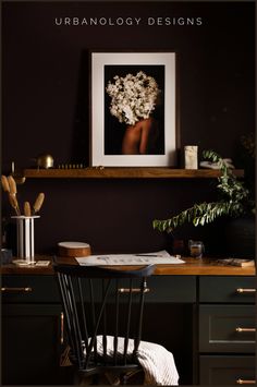 an image of a desk with flowers in the middle and text that reads urbanlogy designs