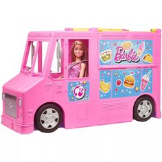 a pink toy food truck with barbie on the side and an ice cream cone in the back