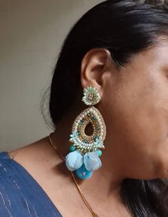 "Bohemian handmade statement turquoise blue embellished large earrings. These beautiful turquoise earrings are hand crafted beautifully using various material like fabric, glass, chatton,pompoms etc. An ideal summer party earrings The rarrings measure about approx. 3.80\" long and 2.20\" wide. Each beautiful Carnation jewellery piece is handcrafted in India and ship from India. Please note, Since our product is purely handmade in nature hence a slight imperfection may be there. But I try and mak Bohemian Drop Bridal Earrings For Festive Occasions, Bohemian Bridal Drop Earrings For Festive Occasions, Bohemian Style Bridal Drop Earrings For Festive Occasions, Bohemian Blue Earrings For Party, Bohemian Beaded Drop Bridal Earrings, Bohemian Beaded Bridal Drop Earrings, Bohemian Beaded Bridal Earrings, Bohemian Drop Bridal Earrings For Festivals, Festive Bohemian Bridal Earrings