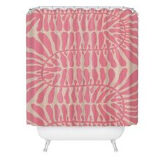 a pink shower curtain with an animal print