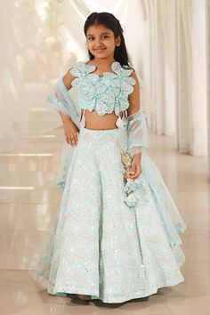 Powder blue attached cancan lehenga with geometric mirror and thread embroidery. Paired with a top with 3D flowers, pearls and tassels and net embroidered dupatta. - Aza Fashions Indowestern Outfits For Girls, Kids Indo Western Outfits, Light Blue Dress For Diwali Party, Light Blue Embellished Sets For Festive Occasions, Light Blue Party Dress For Diwali, Festive Blue Sets With Pearl Embroidery, Light Blue Party Sets With Mirror Work, Festive Blue Lehenga With Pearl Embroidery, Blue Sets With Pearl Embroidery For Reception