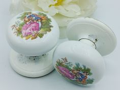 Vintage 2 Gainsborough Porcelain Door Knobs - Fragonard Courting Couple Scene - White Porcelain Door Knob Set - Salvaged Door Knob Hardware Pair of Gainsborough Australia White Porcelain Door Knobs with Courting Couple Scene. Extremely rare and hard to find this design. Perfect addition for a Hollywood regency vintage home. They measure 2 1/2" in length. Overall great vintage condition, the back plates have been painted and the knobs have areas of paint as well, can easily be removed and backpla Couple Scene, Salvaged Door, Porcelain Door Knobs, Hollywood Regency Decor, Back Plates, Back Plate, Door Knob, Vintage Pottery, Hollywood Regency