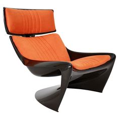 an orange and black lounge chair