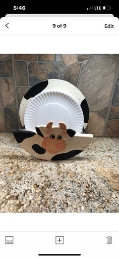 a paper plate with a cow design on it