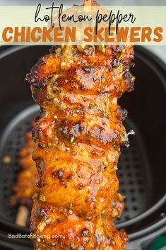 chicken skewers in an air fryer with text overlay