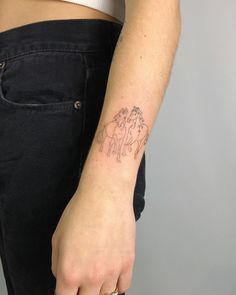 a person with a tattoo on their arm