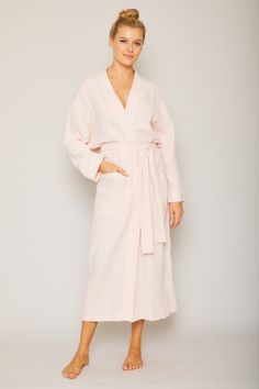 Pour Les Femmes’ Angel Long Robe in Pink A soft and serene hand feel, our angel fabric garments envelop the body in superior comfort without compromising on breathability.Featuring long sleeves, front pockets, mid-calf length, and includes a self-belt.This garment includes a matching lingerie bag. Handcrafted in Pour Les Femmes' Exclusive Multi-Layer Gauze. Made in our Fair Trade Workshop in the Indus Valley Model 5'8" Wearing: Size SmallDesigned for a classic fit. Made true to size CARE INSTRUC Angel Fabric, Indus Valley, Matching Robes, Robin Wright, Silk Tunic, Cozy Gift, Japanese Cotton, Silk Shorts, Sleepwear & Loungewear