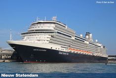 a large cruise ship docked in the water