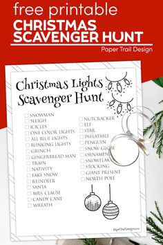 a printable christmas light scavenger hunt is shown on a table with pine branches