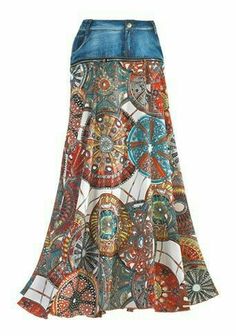 a women's skirt with an intricate pattern on the bottom and side, in blue denim