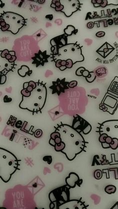 an image of hello kitty wallpaper with pink and black designs on white background,