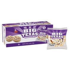 two bags of big texas crackers sitting next to each other