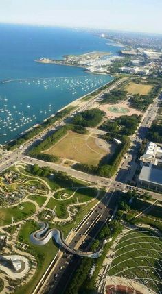 an aerial view of a city with lots of water