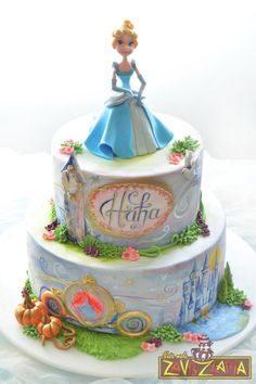 a birthday cake with a princess on top