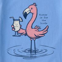 a blue shirt with a pink flamingo holding a drink in it's beak