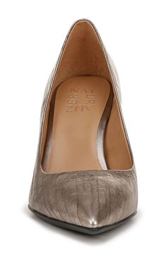 A pointy-toe pump with a flexible sole and comfy cushioning is styled with a curving topline that dips along the sides to show extra bits of skin. 3 1/4" heel Contour+ comfort technology Padded footbed Arch support Leather upper/synthetic lining and sole Imported Women's Shoes