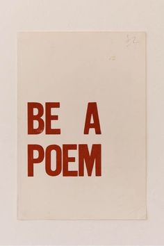 a piece of paper with the words be a poem printed on it in red ink