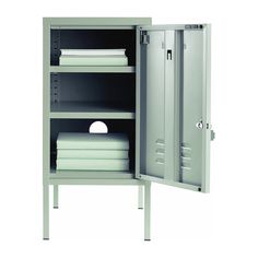 an open metal cabinet with white sheets and folded towels in it's door, on a white background