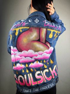 It's time to upgrade your closet with a signature jacket that represents your unique style and spirit! I take your ideas and paint them onto denim jean jackets~ You can provide portraits of people or pets, song lyrics, your favorite flowers, animals, movies, pop-culture references, characters, superheroes, etc. THE SKY IS THE LIMIT!~ Custom hand-painted denim jackets are the perfect gift for yourself, and your loved ones, bridal parties, anniversary presents, and more! Feel free to message me and we can collaborate to create a stunning jacket or custom purse for you. I am new to Etsy so thank you!! for checking out this listing and my page. Your support and patronage is deeply appreciated. The reference images I have are just a small snippet of what I am able to paint. I can adapt to any c Artistic Denim Jacket For Streetwear In Winter, Pink Denim Jacket For Streetwear, Hand Painted Denim Jacket For Winter Streetwear, Spring Denim Jacket With Custom Artwork For Streetwear, Trendy Hand Painted Outerwear For Streetwear, Fall Denim Jacket With Custom Artwork, Painted Leather Purse, Anniversary Presents, Hand Painted Denim