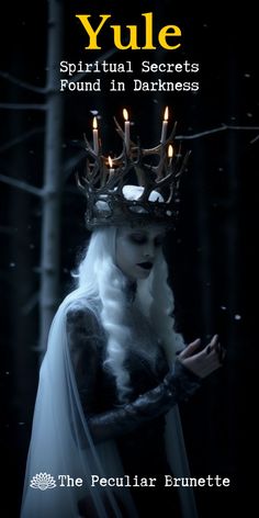 a woman wearing a crown with candles on her head and the words yule written in white