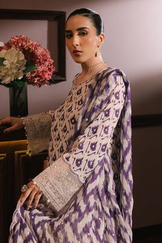 Product Details SHIRTPrinted and embroidered shirt front, back and sleeves (silk)40" embroidered patti for front hem40" embroidered patti for back hem40" embroidered patti for sleevesTROUSERSilk dyed trouserDUPATTAChiffon printed embroidered dupattaATTRIBUTE Elevate your style with our Lavender Luxe 3-Piece Silk Embroidered Suit. This set features a beautifully printed and embroidered silk shirt, complete with a 40" patti hem for the front, back, and sleeves. The matching silk dyed trouser adds Embroidered Suit, Silk Dyeing, Embroidered Silk, Silk Shirt, Embroidered Shirt, 3 Piece, Cross Stitch, Lavender, Chiffon