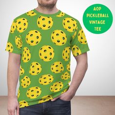 Lightweight, breathable & super stylish Pickleball Tee. Rock this colorful eye-catching shirt on and off the courts! A Pickle Ball lover's must-have item 100% Polyester Regular fit Tagless Runs true to size  MORE PICKLEBALL ITEMS HERE ---> https://www.etsy.com/shop/PureSakusei?ref=dashboard-header&section_id=45819746  PURESAKUSEI STORE FRONT ---> https://www.etsy.com/shop/PureSakusei?ref=dashboard-header  GIFT MESSAGE OPTION IS NOT AVAILABLE ON THIS ITEM  ALL SALES ARE FINAL (Please Read Return Colorful Sportswear, Must Have Items, Pickleball, Vintage Tees, Breathable Fabric, Gift For Lover, Gender Neutral, Adult Outfits, Tops & Tees