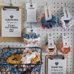 there are many crocheted items hanging on the wall