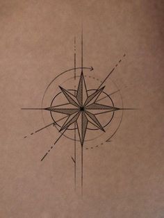 a black and white drawing of a star with lines coming out of the center, on top of a piece of paper