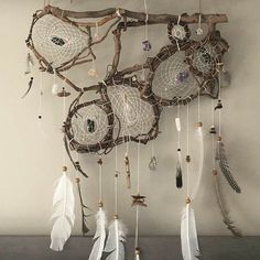 an image of dream catchers hanging on the wall