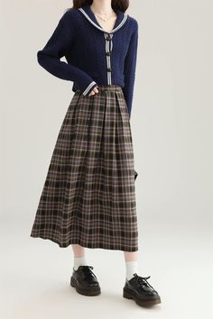 Pleated plaid midi skirt in cozy colors to go with your autumnal fits. Features an elastic waist back. Lined. One Size: 26"-36" waist, 31" length Casual Full Pleated Skirt For Winter, Plaid Lined Skirt For Winter, Plaid Midi Skirt Casual Style, Casual Plaid Midi Skirt, Plaid Midi Skirt For Fall, Casual Full Skirt For Fall, Casual Plaid Skirt For Fall, Casual Plaid Pleated Skirt, Casual Plaid Skirt For Work