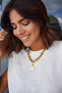 - 18 Inches 18K gold plated Puerto Chain  - Compass Pendant - Hypoallergenic - Non Tarnish  - Gold Plated Stainless Steel  Accessorizing is one of the most important parts of looking stylish and put together. We all know that well-chosen accessories can take an outfit to a whole other level. We know that accessories are what complement the outfit and show that you have taken the time to focus on the details.  #style #fashion #trend #trendy #gold #silver #necklace Tarnish-resistant Yellow Gold Stainless Steel Jewelry, Round Metal Medallion Necklace, Tarnish Resistant, Round Metal Medallion Necklace Tarnish Resistant, Gold-plated Locket Necklace With Adjustable Chain, Gold Plated Tarnish Resistant Pendant Locket Necklace, Gold Plated Tarnish Resistant Locket Necklace, Gold Plated Tarnish Resistant Locket Pendant Necklace, Gold Medallion Charm Necklace With Cable Chain, Gold Medallion Necklace With Cable Chain As Gift