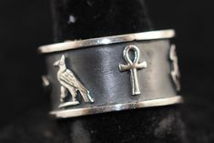 Get your name in ancient Egyptian Hieroglyphics on this wonderful sterling Royal silver Oxidized Ring , Available in Hieroglyphic, Arabic or English Letters (8 letters max) , Available shiny or oxidized Our official page https://www.facebook.com/fromegyptwithlove.epy/ Please contact us if you have any question, thank you for visiting our shop. Our official page https://www.facebook.com/fromegyptwithlove.epy/ Symbolic Hand Forged Rings For Collectors, Hand Forged Symbolic Rings For Collectors, Symbolic Stamped Collectible Rings, Ceremonial Symbolic Rings Stamped 925, Symbolic Antique Silver Engraved Ring For Anniversary, Antique Silver Symbolic Engraved Ring For Anniversary, Symbolic Silver Hand Forged Rings, Symbolic Silver Engraved Ring For Ceremonial Occasions, Symbolic Engraved Ring With Oxidized Finish