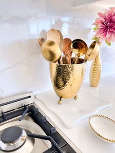 - Material: Metal - Dimension: 7" x 7 x 8.5" H- Please Note: Spoons are not included Ikea Tv Console, Ikea Console Table, Black White Kitchen Decor, Gold Kitchen Utensils, Gold Utensils, Gold Kitchen Accessories, Glam Kitchen, Diy Console Table, Dinner Ware