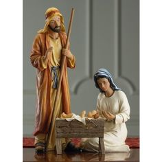 the figurine depicts jesus and baby jesus