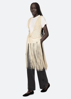 The Simonne macramé vest features fringe detailing. Details: 100% polyester button front closure designed for a relaxed fit style #PF24-190 model is 5'10'' and wearing a size S/M Macrame Vest, Woman Vest, Sea Ny, Black Tank Dress, Black Aviators, Neon Purple, Crochet Vest, Outerwear Vest, Ruched Dress