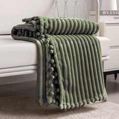 PRICES MAY VARY. 【Pompom & Strip Design】- Flannel fabric with pompoms fringe around the blanket, different color and white stripe pattern with 3D touching offers you amazing senses of softness. The fabulous color revives this blanket with an elegant appearance to complement your room a chic feeling. 【Soft & Lightweight】- The throw we offered is designed to be simple but elegant, this plush throw is super soft, warm and lightweight. Fleece bed blanket brings you more breathable and lightweight fe Green Throw Blanket, Green Blanket, Green Throw, Microfiber Blanket, Twin Blanket, Knit Throw Blanket, Couch Throws, Blanket Throw, Bed Sofa